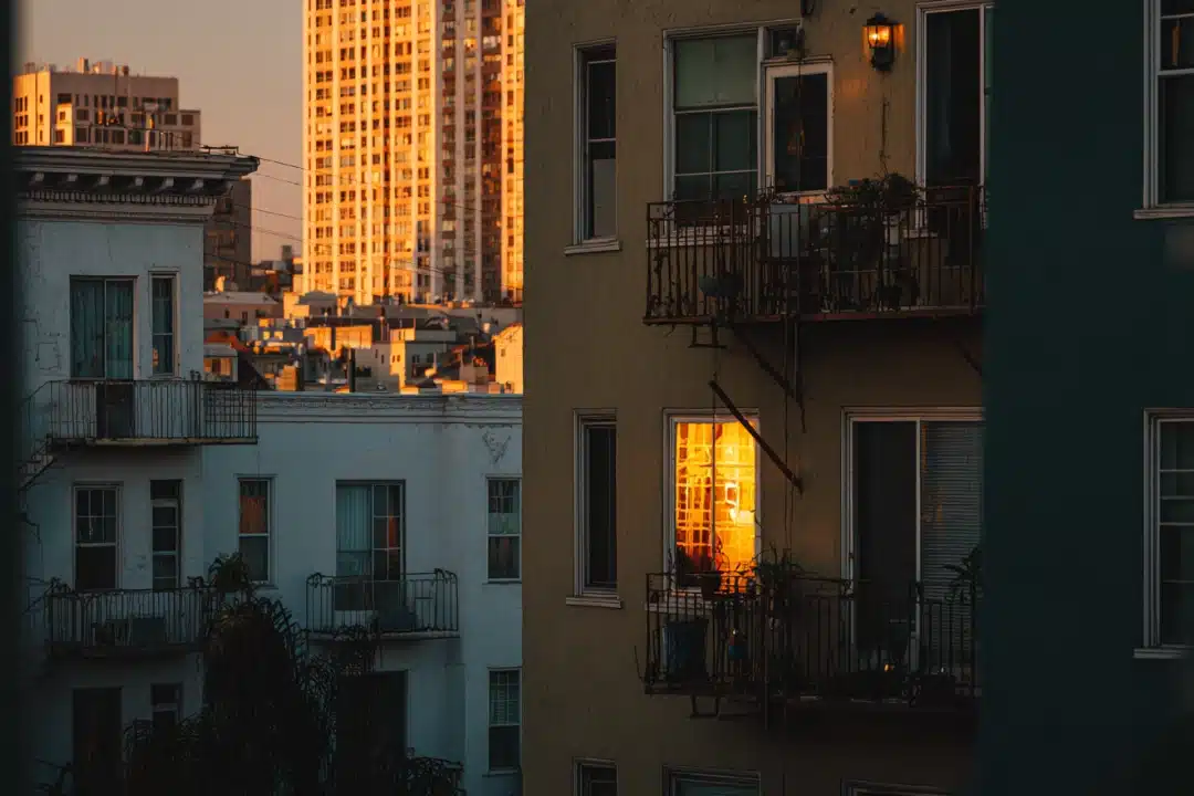Apartment buildings in the evening light representing tenant housing rights and legal protections for California renters.