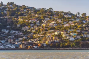Hillside waterfront neighborhood with colorful homes overlooking the bay in Sausalito.